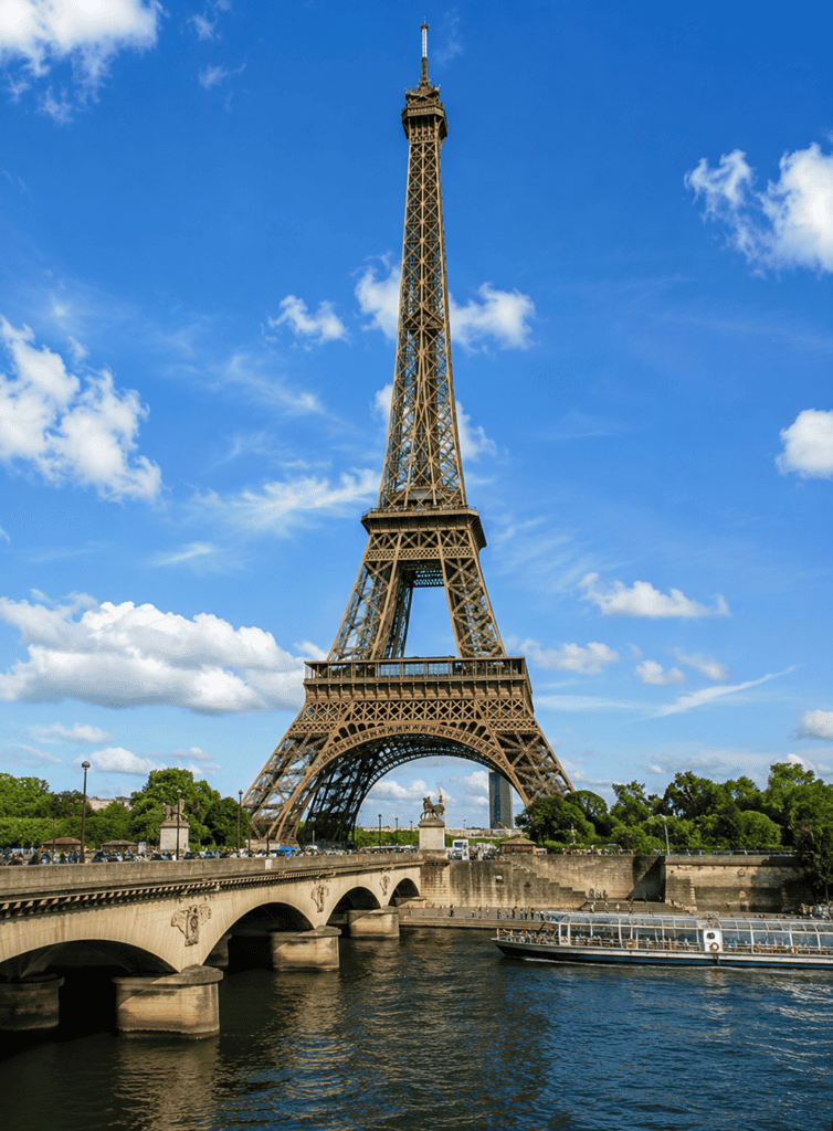 Iconic Eiffel Tower standing tall over the Seine River in Paris, France.